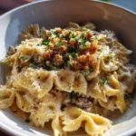 Garlic Butter Bowtie Pasta With Sautéed Beef And Walnut Ginger Crumble 6 Garlic Butter Bowtie Pasta With Sauteed Beef And Walnut Ginger Crumble 1767825697.5499833