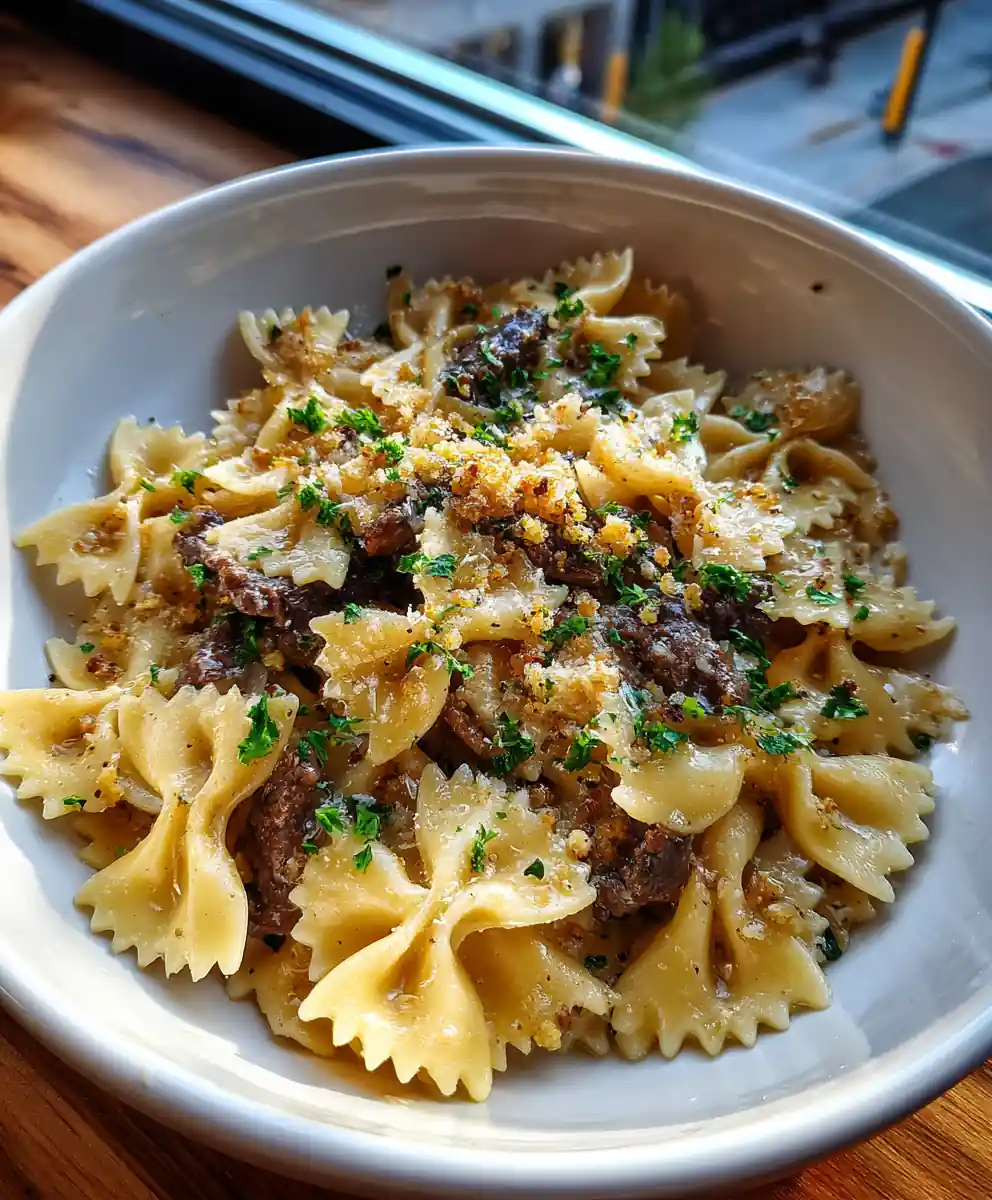 Garlic Butter Bowtie Pasta With Sautéed Beef And Walnut Ginger Crumble 5 Garlic Butter Bowtie Pasta with Sautéed Beef and Walnut Ginger Crumble
