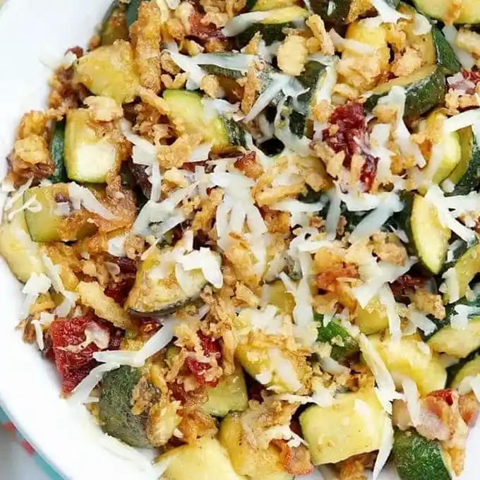 Sautéed Zucchini with Sun-Dried Tomatoes, Smoked Turkey Bacon, and Crispy Onions 3 Recipe image