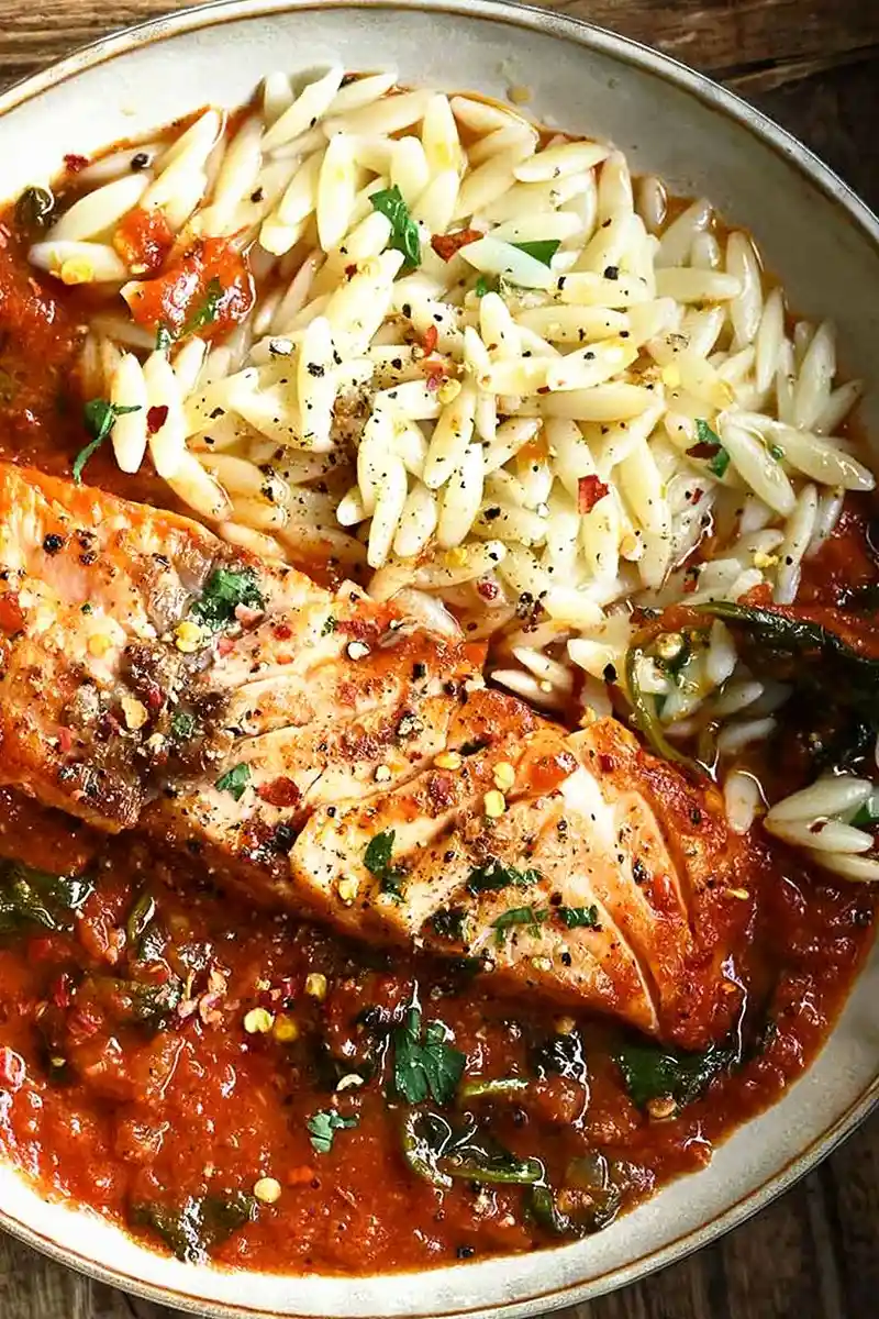 Spicy Salmon all'Arrabbiata with Wilted Spinach 3 Recipe image